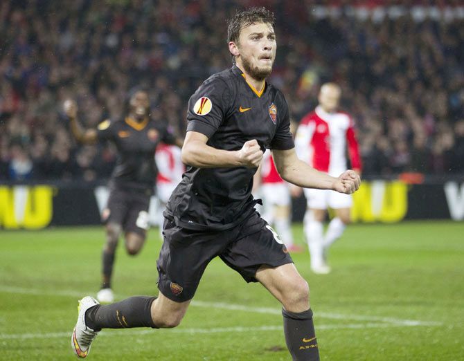 Adem Ljajic of AS Roma celebrates his goal against Feyenoord during their Europa League round of 32 second leg match at the Kuip stadium in Rotterdam