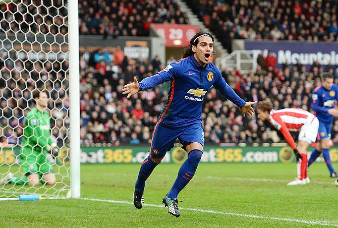 Radamel Falcao of Manchester United celebrates after scoring the equaliser