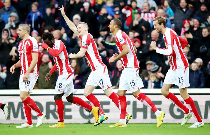 Ryan Shawcross of Stoke City celebrates scoring against Manchester United.