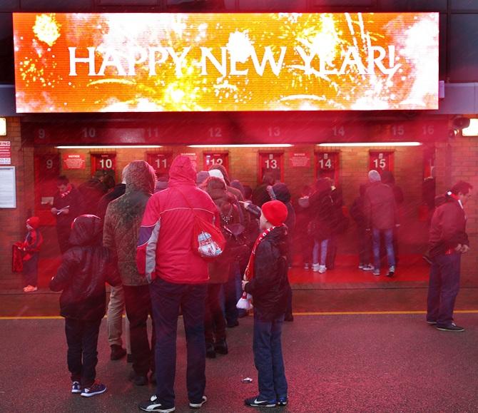 Fans arrive at the stadium prior to kickoff during the Barclays Premier League match 