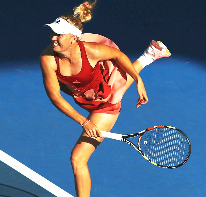 Caroline Wozniacki of Denmark serves