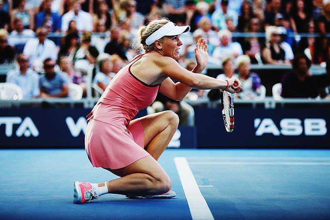  Caroline Wozniacki of Denmark plays a forehand against Taylor Townsend of USA during the 2015 ASB Classic in Auckland on Wednesday