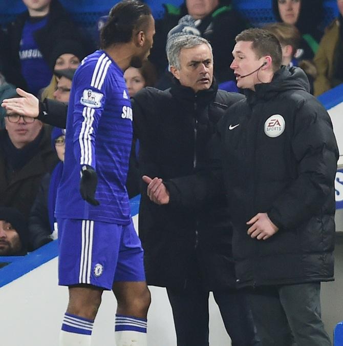 Jose Mourinho manager of Chelsea and Didier Drogba of Chelsea appeal to the fourth official