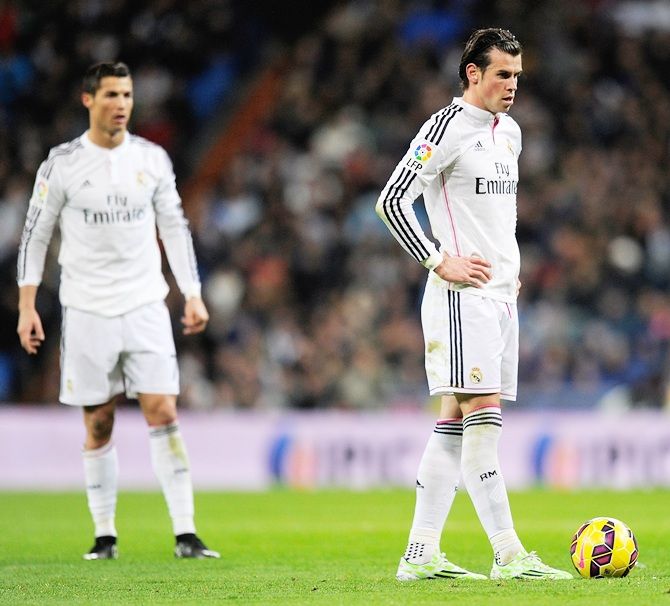 Cristiano Ronaldo and Gareth Bale of Real Madrid get ready to kick off