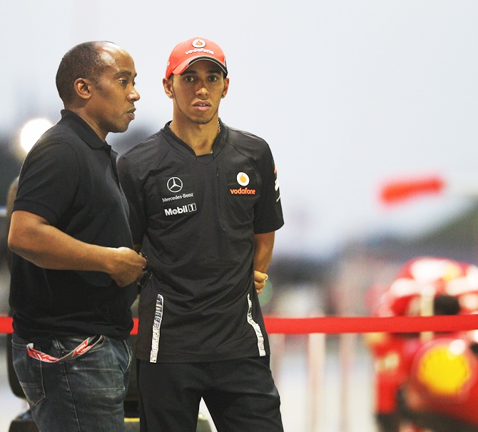 Lewis Hamilton of Great Britain and McLaren and his father Anthony Hamilton 