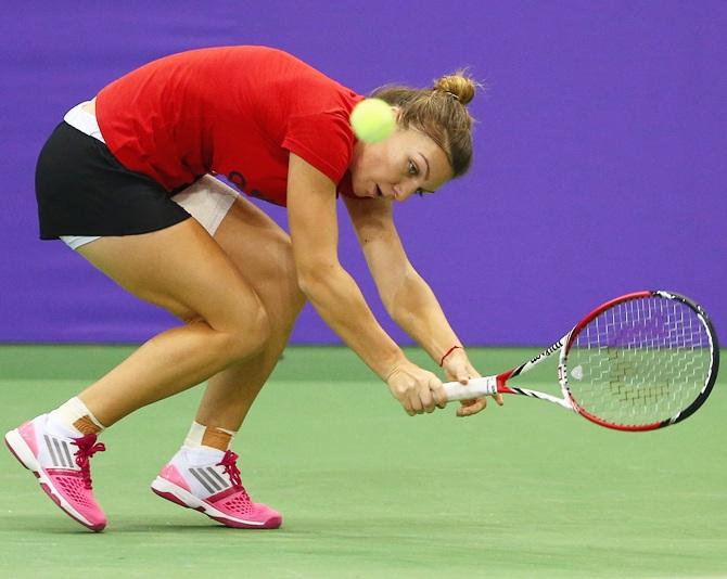 Simona Halep of Romania practices