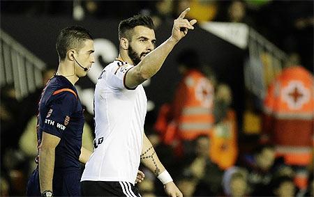  Valencia's forward Alvaro Negredo celebrates after scoring against Almeria during their La Liga match at the Mestalla stadium in Valencia on Saturday