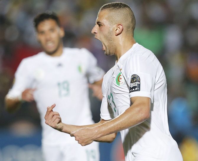 Algeria's Islam Slimani celebrates his goal