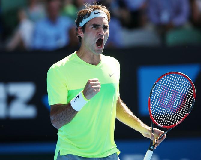 Roger Federer of Switzerland celebrates a point during his second round match against Simone Bolelli of Italy during the 2015 Australian Open at Melbourne Park on Wednesday