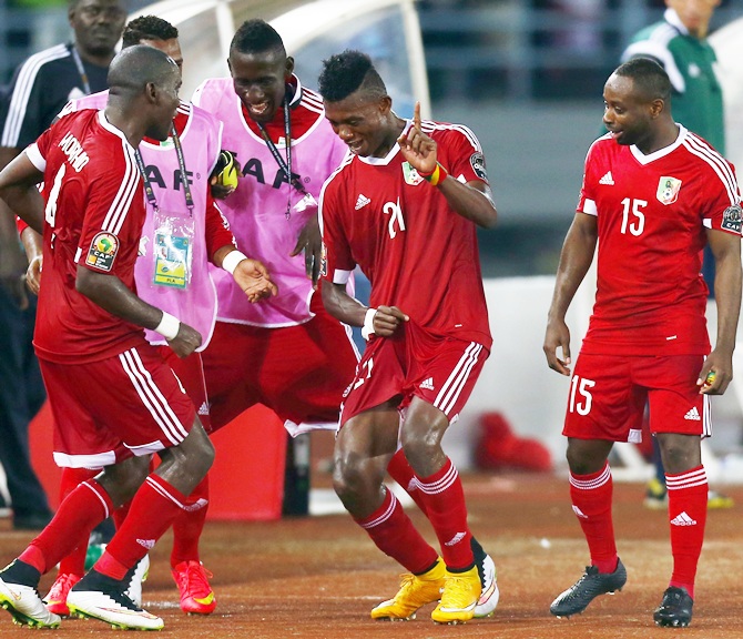 Congo's players celebrate and dance after their match