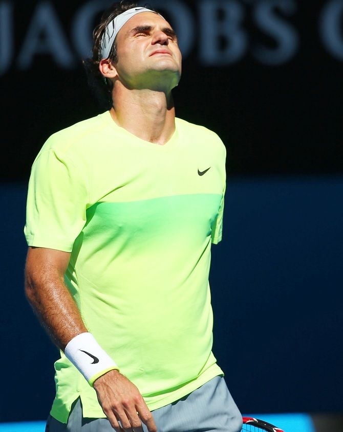 Roger Federer of Switzerland reacts 