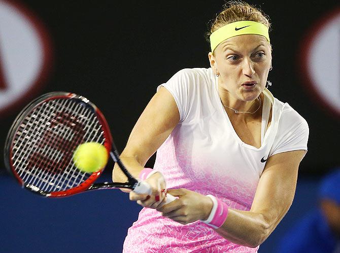 Petra Kvitova of the Czech Republic plays a backhand against Madison Keys of the USA