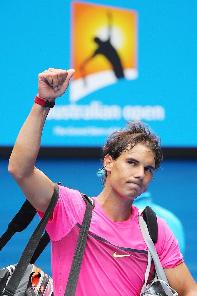 Rafael Nadal of Spain leaves the court after losing in his quarter-final against Tomas Berdych of the Czech Republic on Tuesday