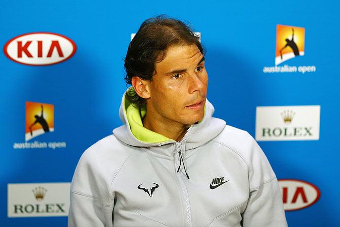 Rafael Nadal of Spain speaks to reporters after his quarterfinal loss to Tomas Berdych of the Czech Republic