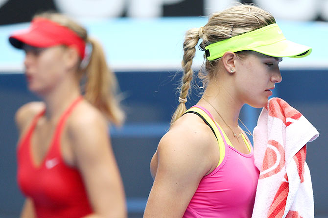 Eugenie Bouchard of Canada wipes her face during her quarter-final on Tuesday