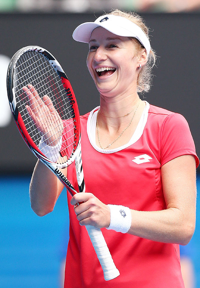 Ekaterina Makarova of Russia celebrates after beating Simona Halep of Romania to win the quarter-final