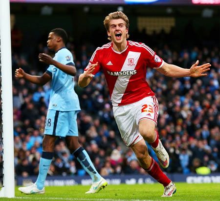 Patrick Bamford of Middlesbrough celebrates after scoring the opening goal during the FA Cup Fourth Round match against Manchester City