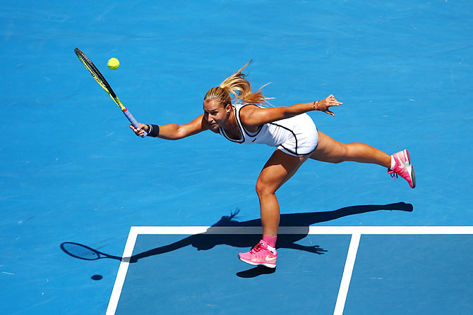 Dominika Cibulkova plays a forehand in her quarter-final against Serena Williams