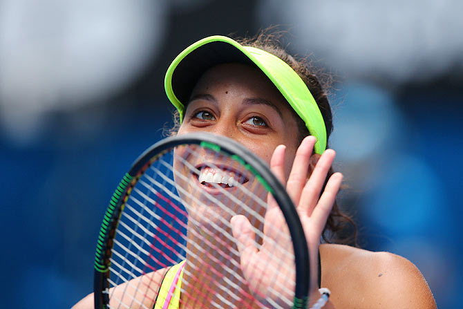 Madison Keys of the United States celebrates winning her quarter-final against compatriot Venus Williams on Wednesday