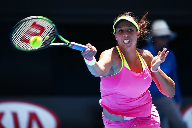 Madison Keys of the United States plays a forehand in her quarterfinal match against Venus Williams