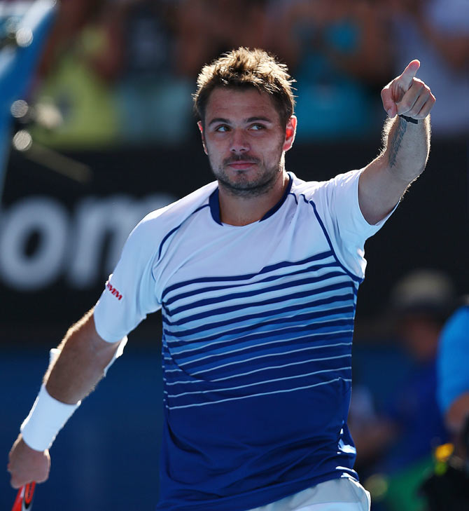 Stanislas Wawrinka celebrates after beating Kei Nishikori on Wednesday