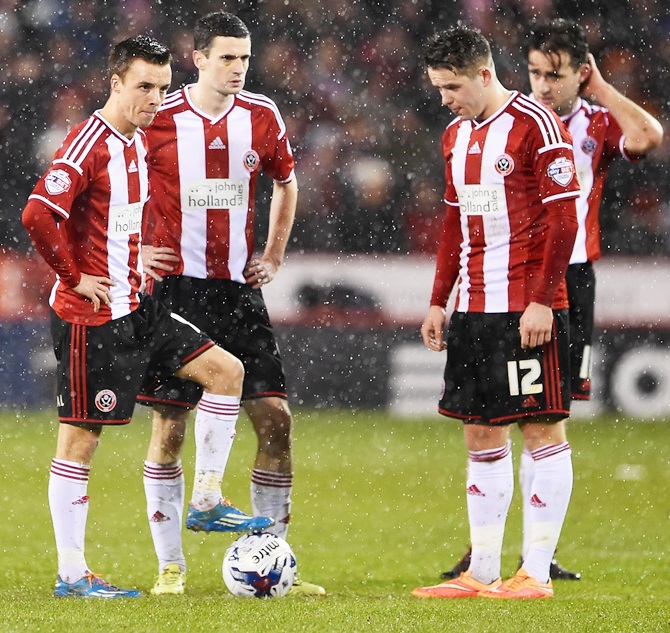 Sheffield United players look dejected