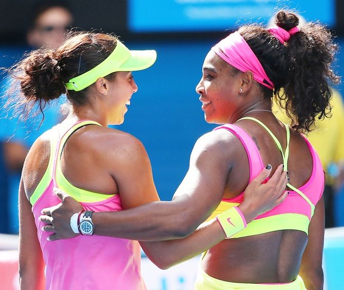 Serena Williams of the United States hugs Madison Keys