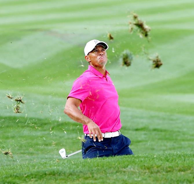 Tiger Woods in full stride. 2015 was a year of pain for the greatest golfer of all time. Photograph: Mark J Rebilas-USA TODAY Sports/Reuters