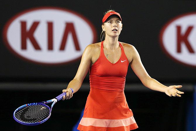 Maria Sharapova reacts to a point in her match against Serena Williams