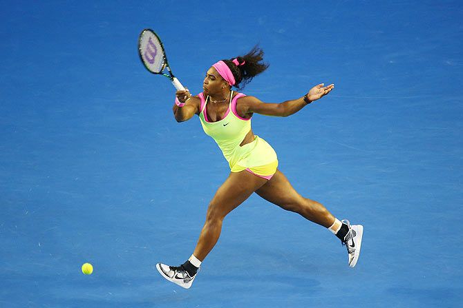  Serena Williams of the United States plays a forehand against Maria Sharapova