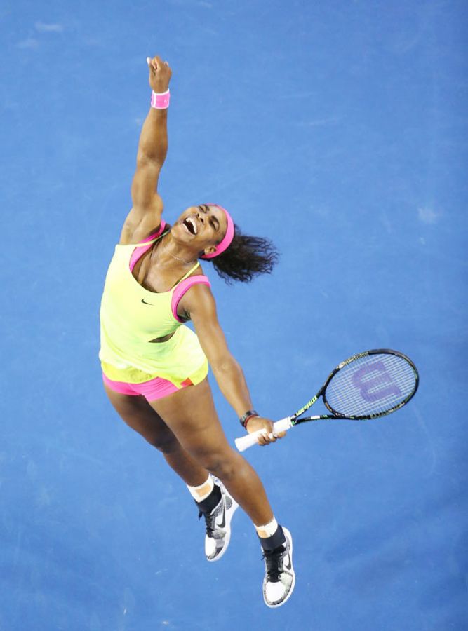 Serena Williams of the United States is ecstatic after winning championship point to beat Maria Sharapova of Russia and claim the Australian Open women's title at Melbourne Park Saturday