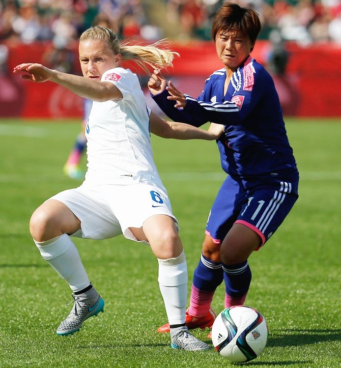 Laura Bassett of England in action with Shinobu Ohno of Japan