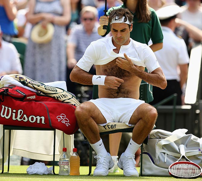 Wimbledon 'all-white' clothing rule is quite extreme: Federer - Rediff