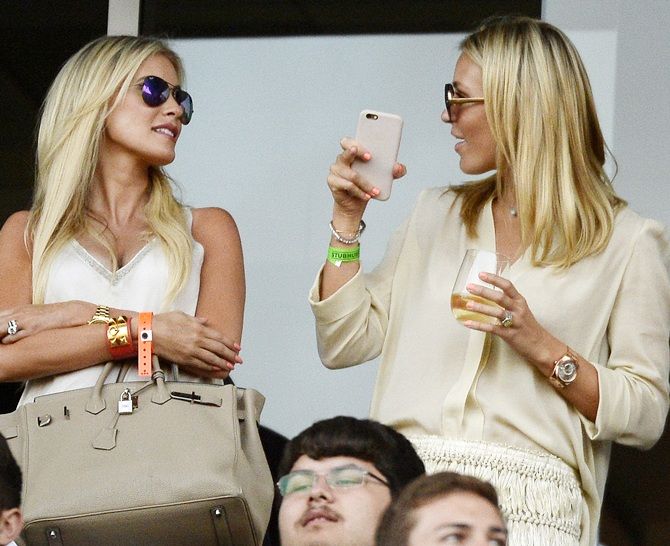 Alex Curran, right, wife of new Los Angeles Galaxy midfielder Steven Gerrard and Claudine Keane wife of Los Angeles Galaxy forward Robbie Keane 