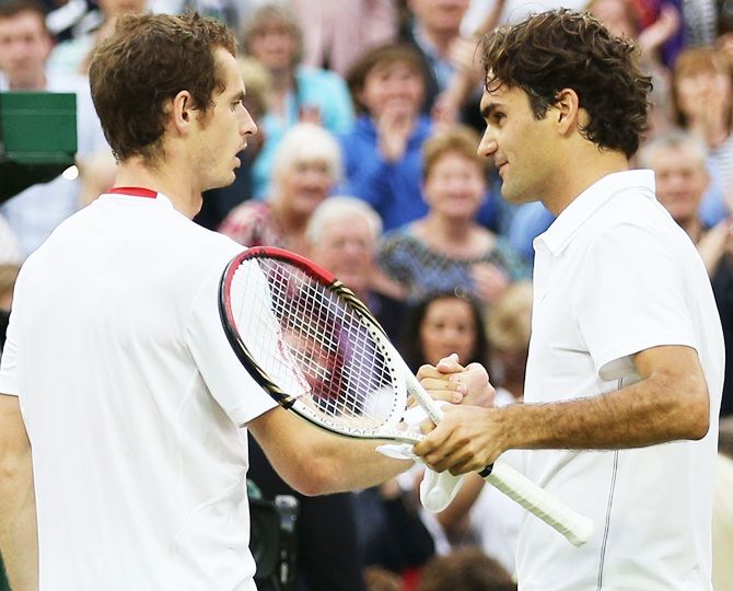 Switzerland's Roger Federer, right, shakes hands with Andy Murray 