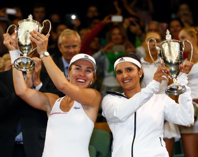 Sania Mirza (right) and Martina Hingis