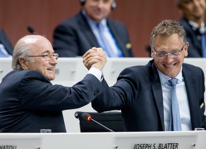 Joseph S. Blatter, left, shakes hands with FIFA Secretary General Jerome Valcke
