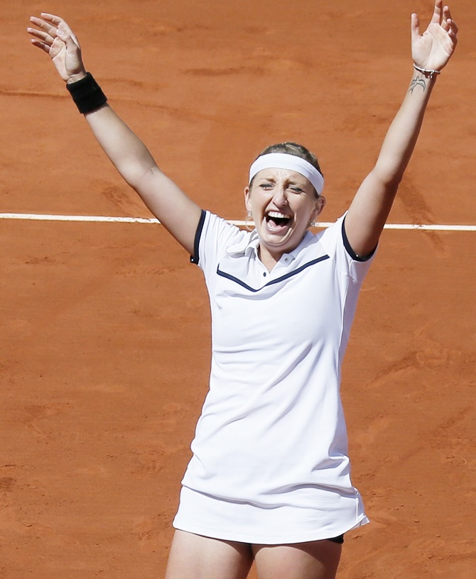 Timea Bacsinszky of Switzerland celebrates