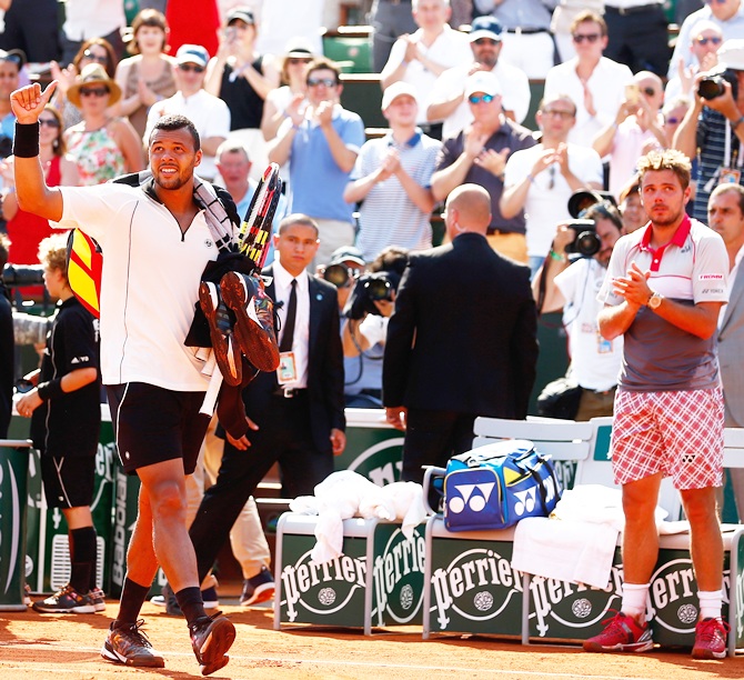 Jo-Wilfried Tsonga of France gestures to the crowd