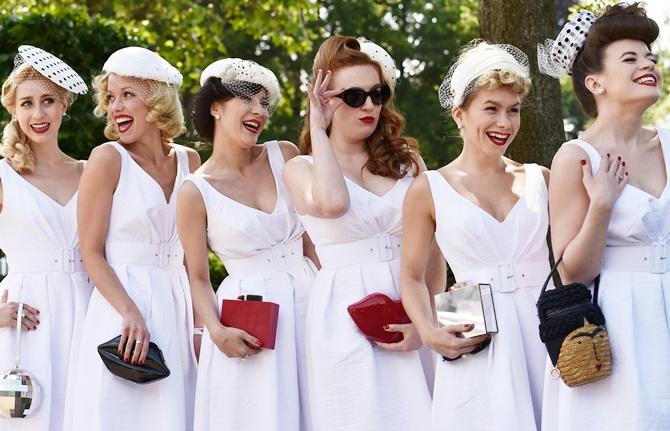 Race goers pose on Ladies Day