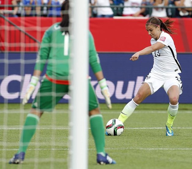 United States forward Alex Morgan scores a goal