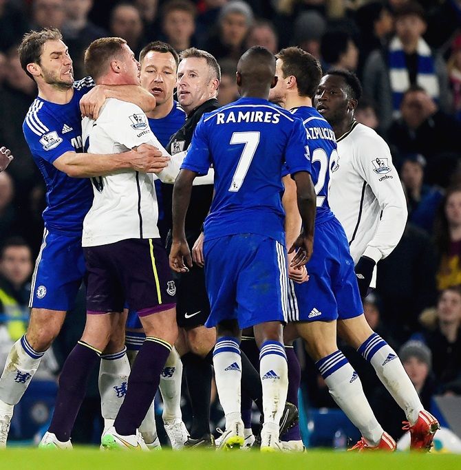 Tempers flare between James McCarthy of Everton and Branislav Ivanovic of Chelsea