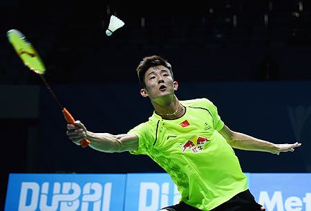 Chen Long of China in action against Kenichi Tago of Japan 