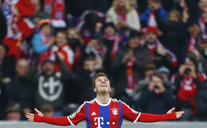 Bayern Munich's Mario Goetze celebrates his goal against Eintracht Braunschweig in their German Cup (DFB Pokal) soccer match in Munich on Wednesday