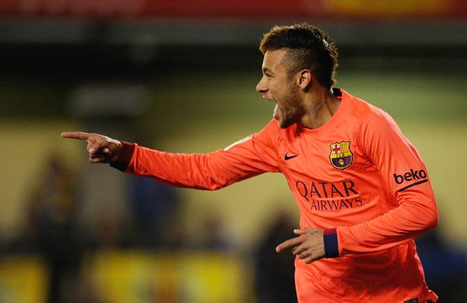 Neymar of FC Barcelona celebrates after scoring his team's opening goal during the Copa del Rey second leg semi-final against Villarreal at El Madrigal stadium in Villarreal on Wednesday