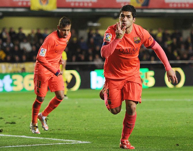 Luis Suarez of FC Barcelona celebrates after scoring