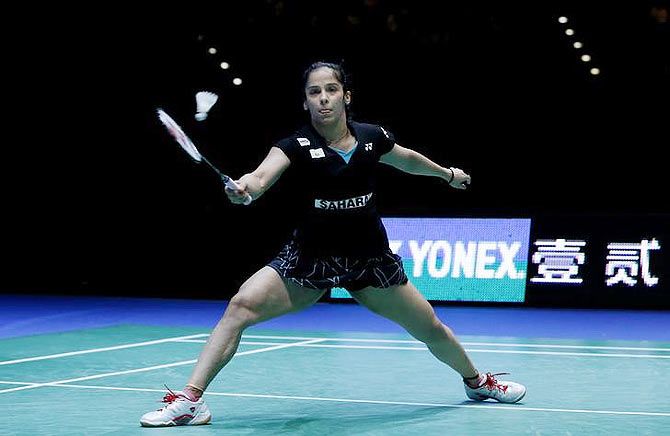 Saina Nehwal in action during the All England Open Badminton Championships 2015 women's singles final against Carolina Marin at the National Indoor Arena in Birmingham on Sunday