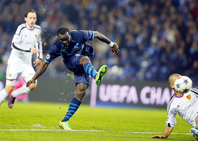 Porto's Vincent Aboubakar strikes to score against FC Basel