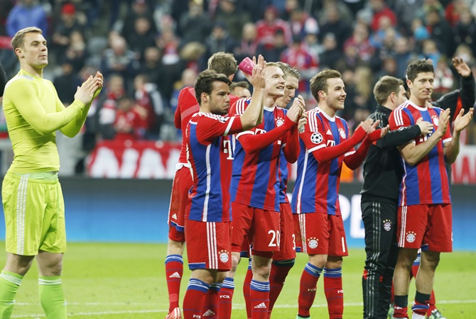 Bayern Munich's players applaud their supporters