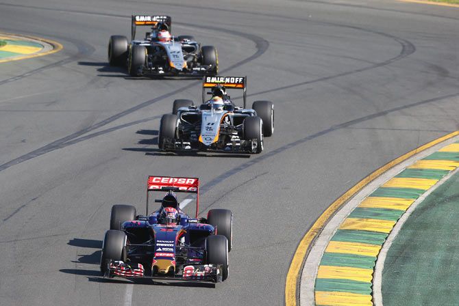 Max Verstappen of Netherlands and Scuderia Toro Rosso drives ahead of Sergio Perez of Mexico and Force India and Nico Hulkenberg of Germany and Force India